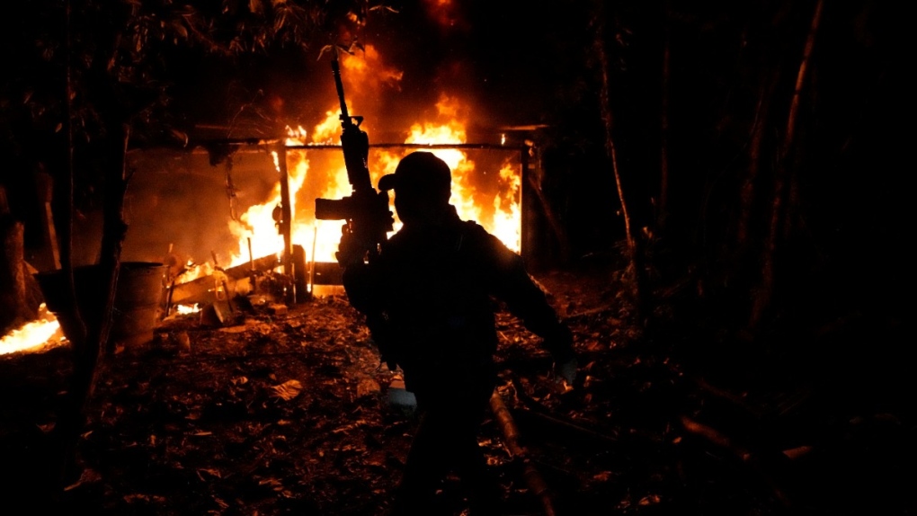 Police burn a coca lab in Putumayo, Colombia