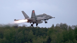 An RCAF CF-18 takes off from CFB Bagotville, Que., June 7, 2018. THE CANADIAN PRESS/Andrew Vaughan