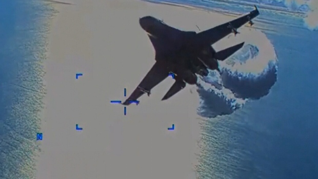 New footage shows fighter dump fuel on drone