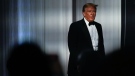 Former U.S. President Donald Trump takes the stage to speak at an event at Mar-a-Lago, on Nov. 18, 2022. (Rebecca Blackwell / AP)