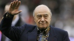 FILE - Fulham owner Mohamed Al-Fayed waves to the crowd before the English Premier League soccer match against Tottenham Hotspur at Craven Cottage stadium, London, Nov. 15, 2008. Al-Fayed, the former Harrods owner whose son Dodi was killed in a car crash with Princess Diana, has died at age 94. His death was announced Friday, Sept. 1, 2023, by Fulham Football Club, which Al-Fayed once owned. (AP Photo/Simon Dawson, File)