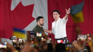 Prime Minister Justin Trudeau introduces Ukrainian President Volodymyr Zelenskyy at a rally at the Fort York Armoury in Toronto on Friday, September 22, 2023. THE CANADIAN PRESS/Nathan Denette