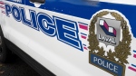 The Laval police logo is seen on a police car, Tuesday, October 18, 2022 in Laval, Que. THE CANADIAN PRESS/Ryan Remiorz