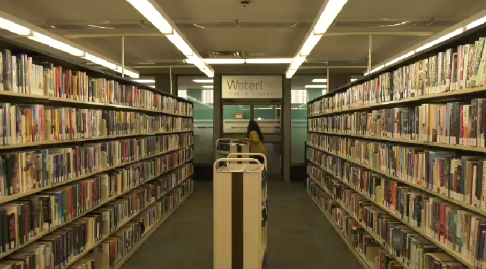 Rows of library books at a public library in this file image. 