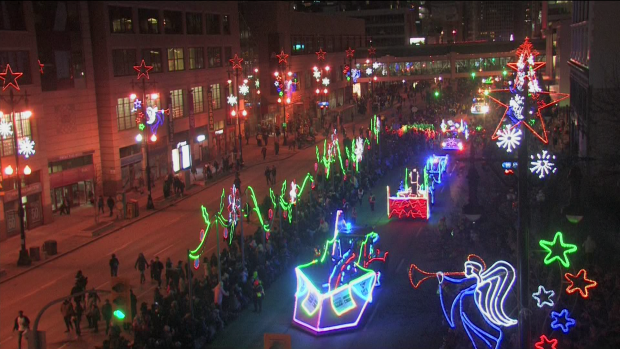 An aerial photo shows floats marching down Portage Avenue during the 2023 Santa Claus Parade. (CTV News Winnipeg Photo)