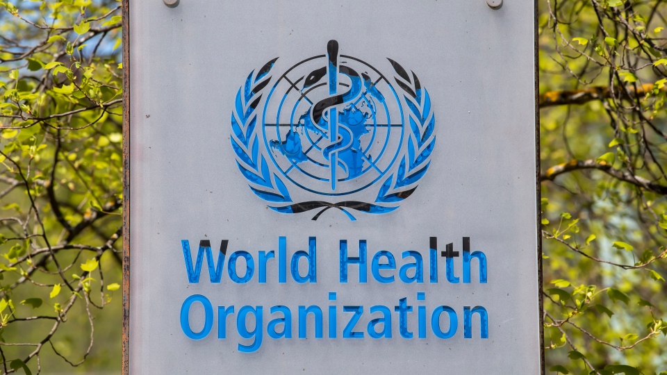 The logo and building of the WHO