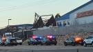 Authorities respond to the scene of a reported building collapse near the Boise Airport on Wednesday, Jan. 31, 2024, in Boise, Idaho. (Terra Furman via AP)