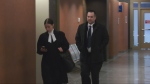Robert Litvack, 43, leaves court with his lawyer on Thursday, April 25, 2024. He is set to go on trial in July 2024 on allegations of sexually assaulting a minor. (CTV News)