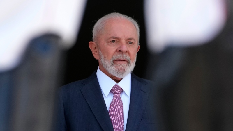 Brazilian President Luiz Inacio Lula da Silva waits for the arrival of Benin's President Patrice Talon at Planalto presidential palace in Brasilia, Brazil, Thursday, May 23, 2024. (AP Photo/Eraldo Peres)