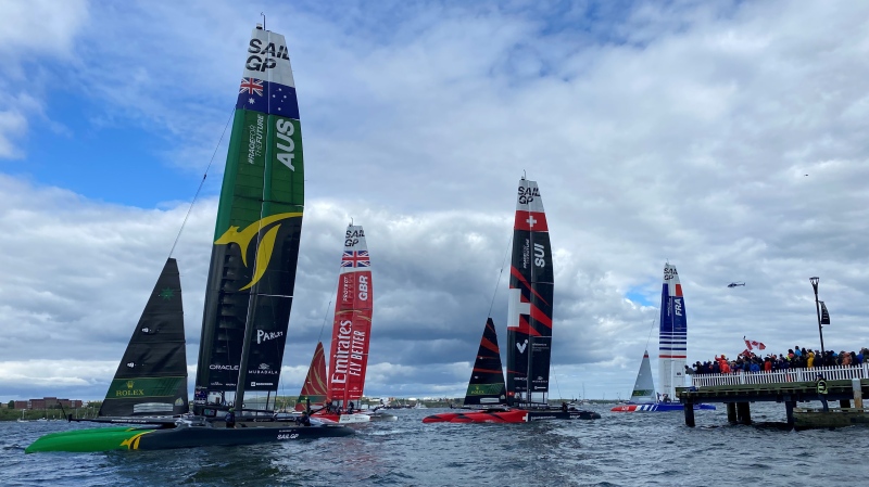 Several boats cruise past the finishing line along the Halifax Harbour as preliminary SailGP races got underway on June 1, 2024. (Jesse Thomas/CTV Atlantic)