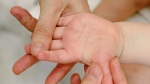 A baby's hand is seen in this undated file image. (Ksenia Chernaya / Pexels)