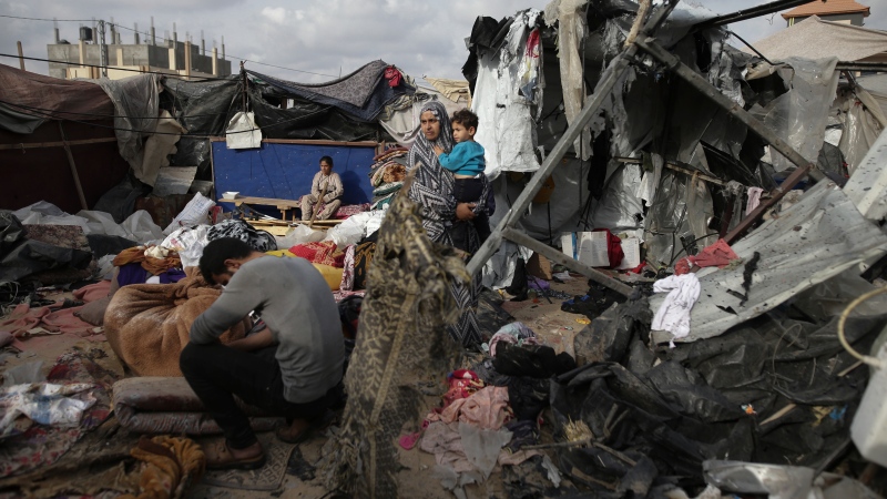 Palestinians inspect their tents destroyed by Israel's bombardment, west of Rafah city, Gaza Strip, on Tuesday, May 28, 2024. (Jehad Alshrafi / AP Photo) 