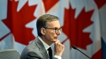 Governor of the Bank of Canada Tiff Macklem participates in a news conference on the Bank of Canada's rate announcement, in Ottawa, on Wednesday, June 5, 2024. THE CANADIAN PRESS/Justin Tang