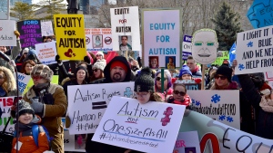 Hundreds of parents, therapists and union members gather outside Queen's Park, in Toronto on Thursday, March 7, 2019, to protest the provincial government's changes to Ontario's autism program. THE CANADIAN PRESS/Frank Gunn
