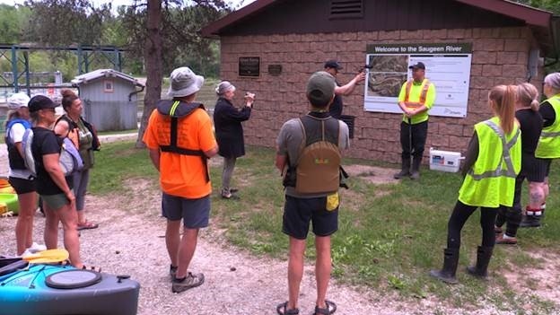 Nick Oldrieve speaks to volunteers about to search the Saugeen River for Lijun, an angler missing since January 2024. June 1, 2024. (Scott Miller/CTV News London)