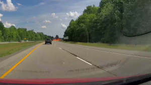 Dash cam video captured the moment a tractor trailer crashed along Highway 416 near Roger Stevens Dr. on Wednesday, June 5, 2024. (Source: Evgeni Koshelev) 
