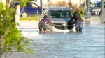 Hazardous flooding conditions in Montgomery shut down a large stretch of 16th Avenue N.W. on Wednesday evening.