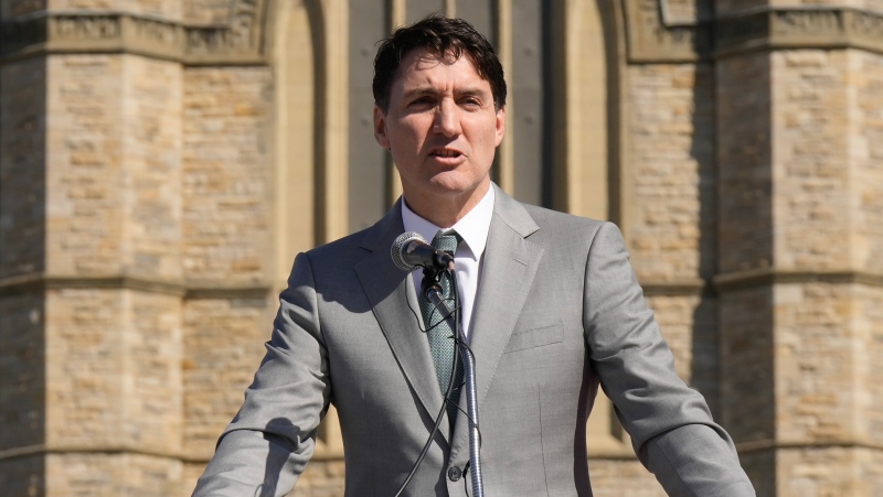 Prime Minister Justin Trudeau speaks during a pride flag raising event on Parliament Hill, in Ottawa, Monday, June 3, 2024. THE CANADIAN PRESS/Adrian Wyld