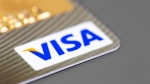 The Visa logo is seen on a credit card in this file photo. (Primakov / Shutterstock.com)