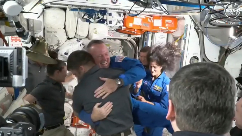 NASA astronauts Butch Wilmore and Suni Williams are greeted by the crew of the International Space Station on Thursday, June 6, 2024. (NASA via AP)