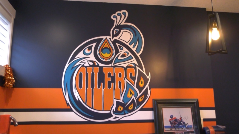 Muralist celebrating the Oilers through art