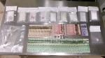 This photo from the Oliver RCMP shows drugs and cash seized from impaired drivers. 