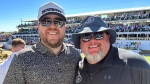 Jeremy Malone, left, and Judson Dymond, the co-owners of The Sportsbook Bar & Grill in Greenwood, Colo., pose for a photot. An arsonist burned down the bar in January. Both co-owners have a parlay they created before the fire that will pay off nearly $600,000 if the Edmonton Oilers win the Stanley Cup Final and help pay for improvements. (Credit: Jeremy Malone)