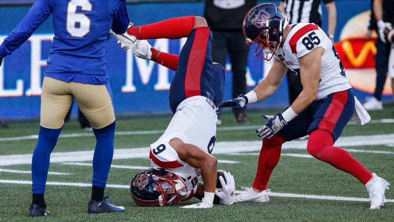 Montreal Alouettes' Tyson Philpot (6) runs the ball in for the touchdown during first half CFL action against the Winnipeg Blue Bombers in Winnipeg Thursday, June 6, 2024. (John Woods, The Canadian Press)