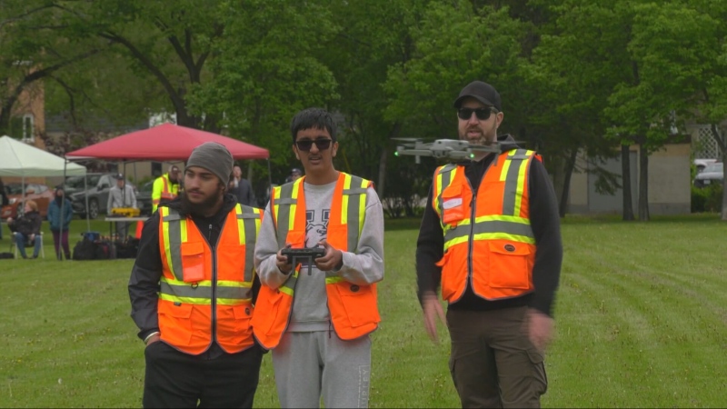 Winnipeg students pilot a drone in Kildonan Par on June 6, 2024.The students were learning how to collect aerial data, and how drones can be used to identify Dutch elm disease in the city’s tree canopy. (Scott Andersson/CTV News Winnipeg)