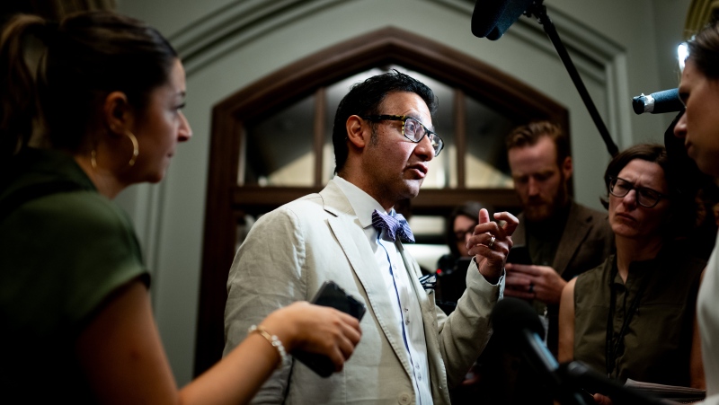 Arif Virani, Minister of Justice and Attorney General speaks to reporters prior to a cabinet meeting on Parliament Hill in Ottawa, on Tuesday, June 4, 2024. (Spencer Colby/THE CANADIAN PRESS)
