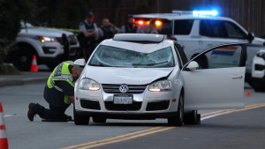 Police respond to a crash involving a pedestrian in Coquitlam, B.C., on June 6, 2024. 