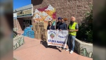 Calgary charity Guru Nanak Free Kitchen handed out hundreds of bottles of water Friday in Bowness, where a major water main break has disrupted the community. The group will be back in Bowness Sunday, handing out more water and free groceries. (Photo: Facebook/Guru Nanak Free Kitchen)