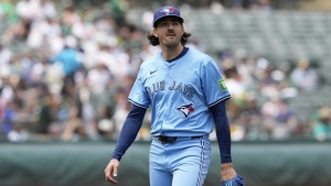 Toronto Blue Jays' Kevin Gausman walks to the dugout after pitching against the Oakland Athletics during the second inning of a baseball game Saturday, June 8, 2024, in Oakland, Calif. (AP Photo/Godofredo A. Vásquez)