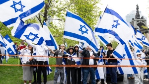 Supporters of Israel gather to celebrate the country's Independence Day in Montreal on Tuesday, May 14, 2024. (The Canadian Press / Christinne Muschi)