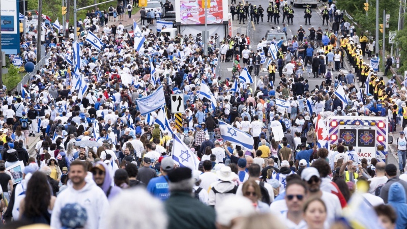 People gather for United Jewish Appeal’s annual Walk With Israel event in Toronto, on Sunday, June 9, 2024. THE CANADIAN PRESS/Arlyn McAdorey