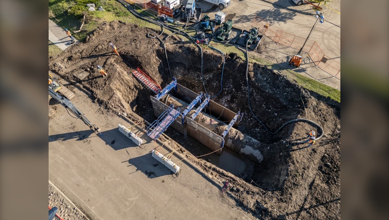 Overhead view of the two-meter pipe that provides water to 60 per cent of the city of Calgary. The city is working to repair it after a Wednesday break. (Photo: X@JyotiGondek)