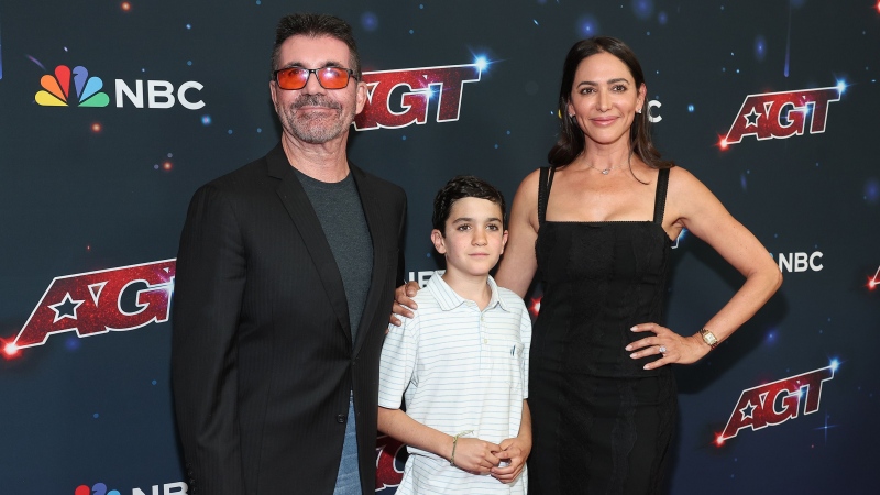 Simon Cowell, Eric Cowell and Lauren Silverman at the "America's Got Talent" Season 18 finale in 2023. (John Salangsang / Variety)