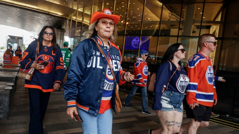 Edmonton Oilers fans arrive for Game 6 of the Western Conference finals of the NHL hockey Stanley Cup playoffs against the Dallas Stars in Edmonton, Sunday, June 2, 2024.THE CANADIAN PRESS/Jeff McIntosh