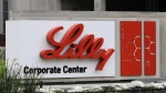 A sign for Eli Lilly and Co. sits outside their corporate headquarters in Indianapolis on April 26, 2017. (Darron Cummings/AP file photo)