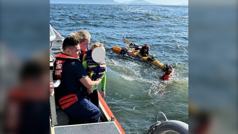 The U.S. Coast Guard rescued a group kayakers, including a child and a dog, off of Lummi Island on Sunday, June 9. (Courtesy: U.S. Coast Guard Pacific Northwest/X) 