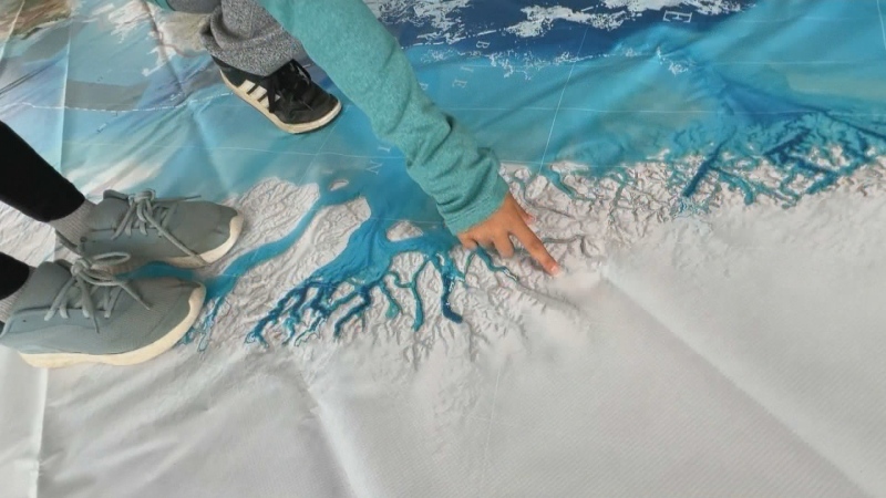 Students 'walk' across Canada with giant floor map