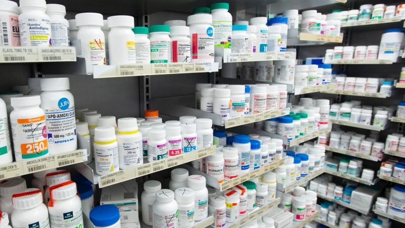 Prescription drugs are seen on shelves at a pharmacy in Montreal on March 11, 2021. (Ryan Remiorz / The Canadian Press)