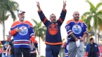 Edmonton Oilers fans arrive to the arena before the Oilers take on the Florida Panthers in game 1 of the NHL Stanley Cup final in Sunrise, Fla. on Saturday, June 8, 2024. THE CANADIAN PRESS/Nathan Denette