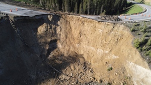 This photo provided by Wyoming Highway Patrol shows a damaged section of Teton Pass near Jackson, Wyo., on Saturday, June 8, 2024, that officials said had “catastrophically failed.” (Wyoming Highway Patrol via AP)