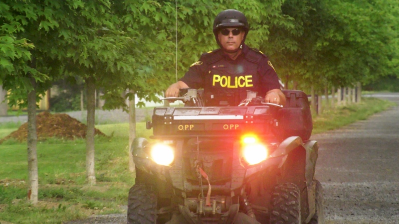 An OPP officer operating an ATV on a trail in Almonte, Ont. on May 6, 2024. (Dylan Dyson/CTV News Ottawa)
