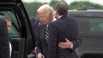 U.S. President Joe Biden greets his son Hunter Biden at Delaware Air National Guard Base in New Castle, Del., Tuesday, June 11, 2024. (AP Photo/Manuel Balce Ceneta)