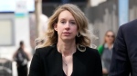 Former Theranos CEO Elizabeth Holmes leaves federal court in San Jose, Calif., March 17, 2023. (AP Photo/Jeff Chiu, File)