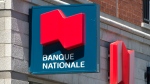 A National Bank sign is seen Monday, May 30, 2016 in Montreal. (Paul Chiasson / The Canadian Press)