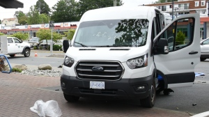 A police van is riddled with bullet holes after the deadly B.C. bank shootout on June 28, 2022. (Saanich police)