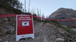 A sign indicating an area closure near Crandell Lake in Waterton Lakes National Park. (Supplied: Parks Canada) 